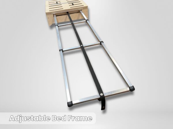 Adjustable bed frame featuring sturdy metal rails, a supportive central strap, and a slatted wooden head section; perfect for transforming your trunk into a comfy sleep setup. Plain background keeps the focus on the innovative design. Text at bottom: “Adjustable Bed Frame.”.