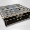 Trunk Mate Sleeping Platform’s black storage box featuring ventilation slats, a sturdy pull-out drawer, and an easy-grip handle, shown on a clean light gray background.