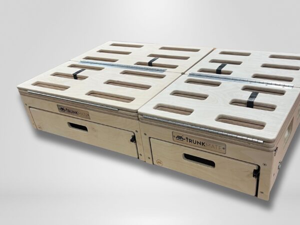 Wooden Trunk Mate storage drawers with durable metal handles and slotted lids, custom-fit for easy vehicle trunk organization.