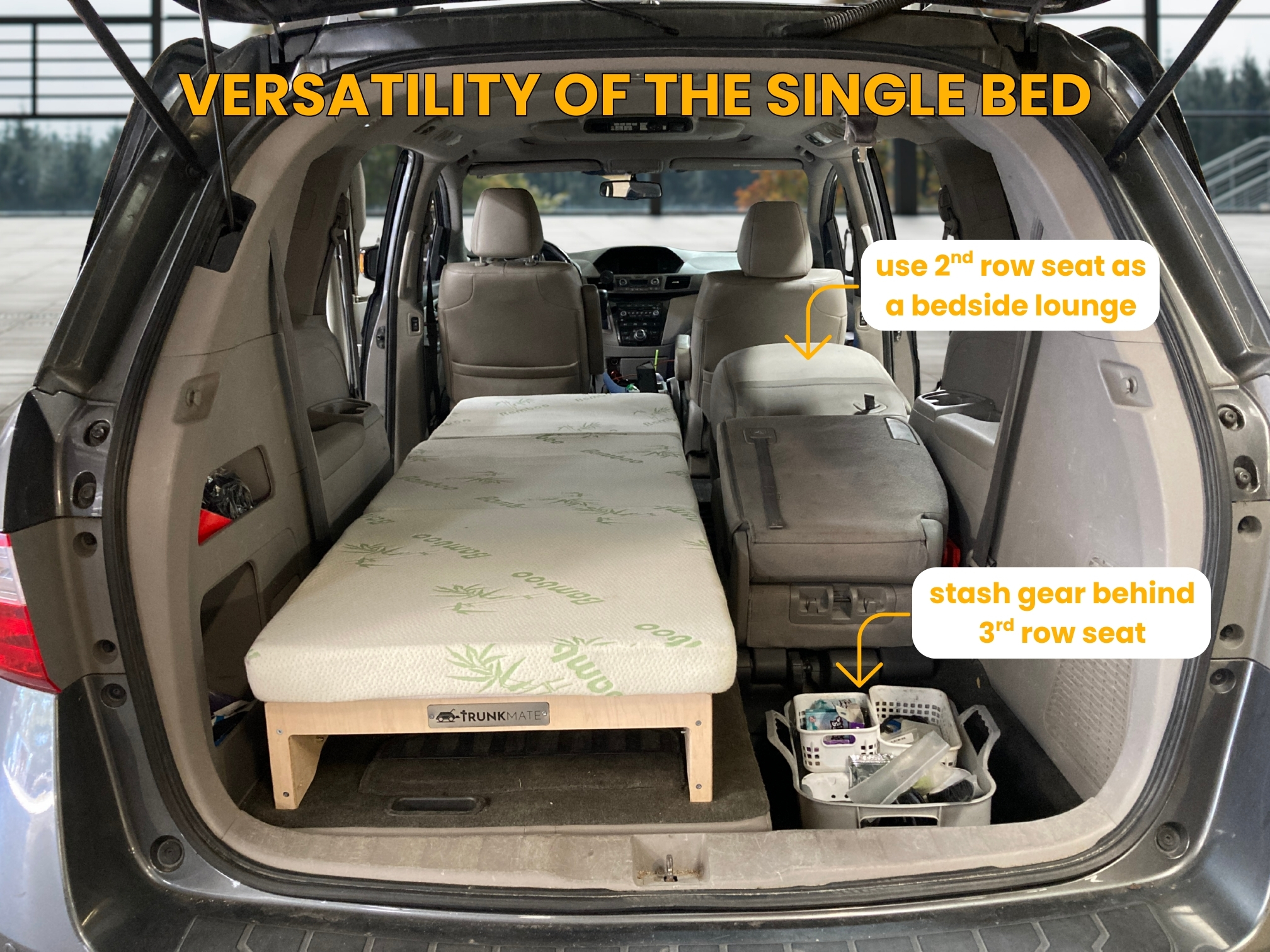 Trunk Mate Sleeping Platform in SUV: single bed set up, second row lounge, gear organized behind third row, labeled features.